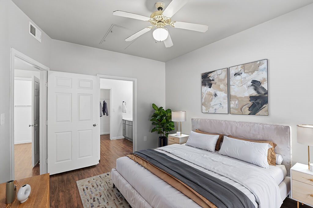 Bedroom with attached bathroom at Almeda Park Apartments in Houston TX